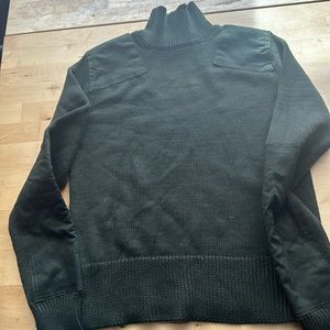 Knitted green sweater